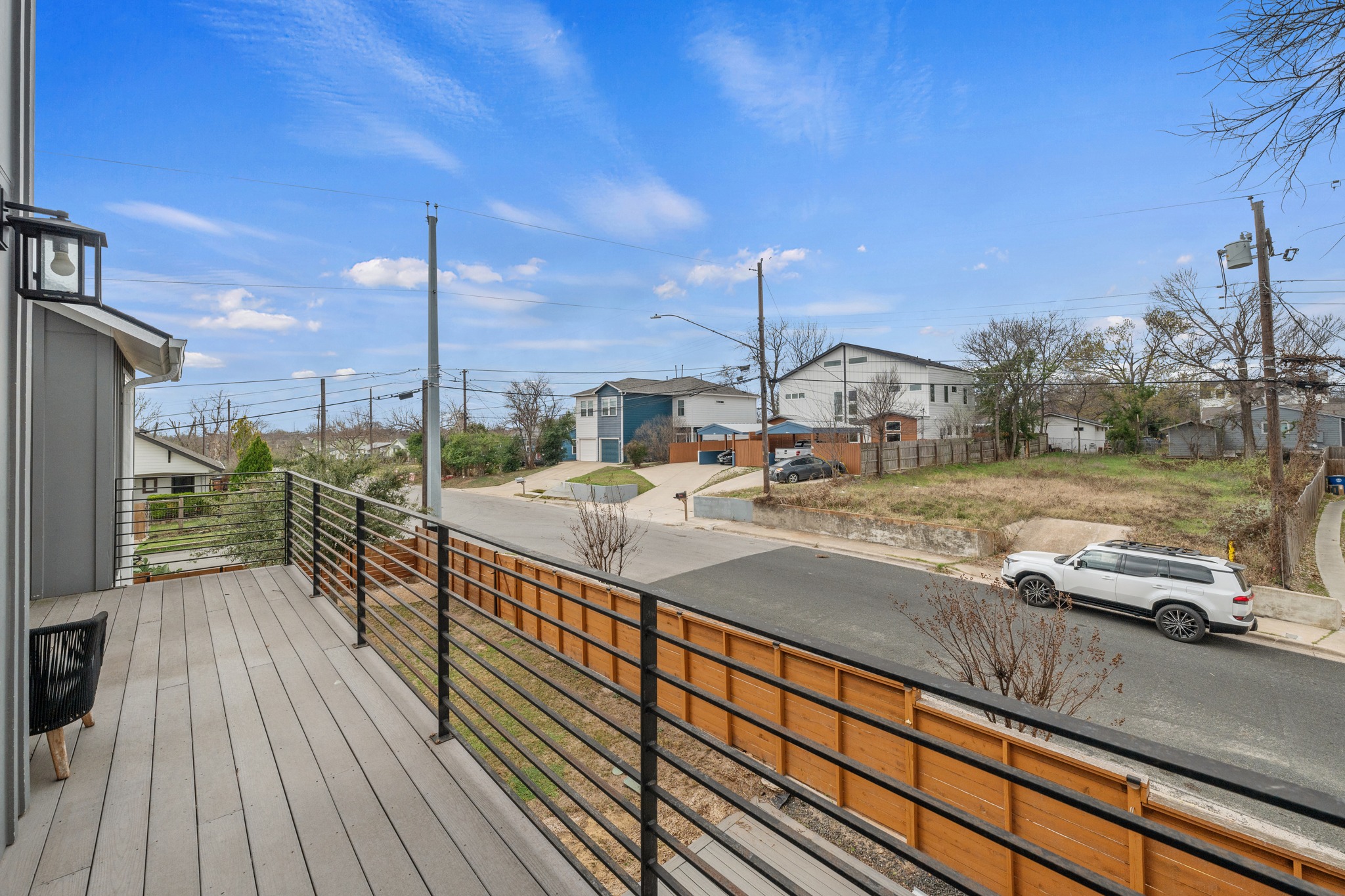 5000 Baker Street Austin, TX 78721 - Photo 27 of 40 From the balcony, the elevated vantage point offers open views across the surrounding East Austin neighborhood, creating a relaxed spot to take in the changing light throughout the day