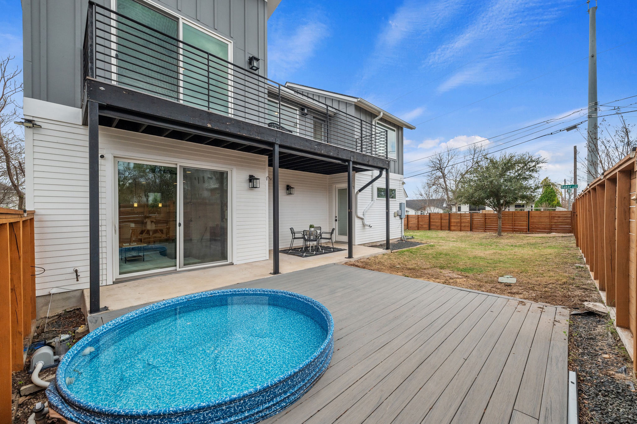 5000 Baker Street Austin, TX 78721 - Photo 39 of 40 Just beyond the patio, a custom-built deck surrounds the cowboy pool, creating a dedicated outdoor hangout space designed for cooling off on warm Austin afternoons