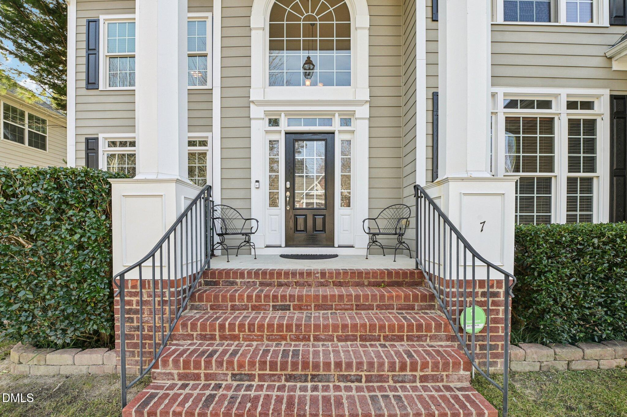 7 Brightfield Lane Durham, NC 27712 - Photo 2 of 41 a front view of a house with a porch