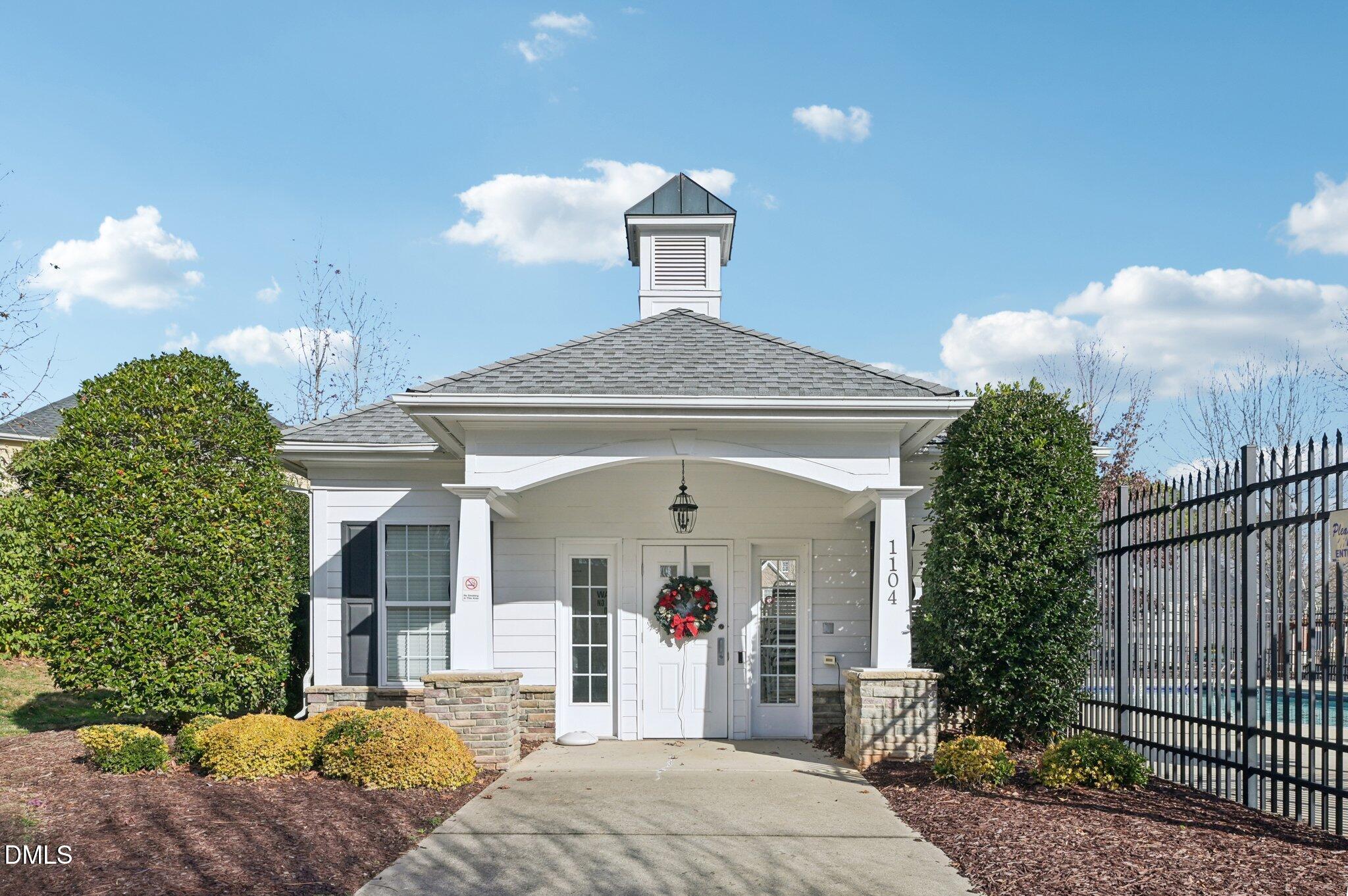 7 Brightfield Lane Durham, NC 27712 - Photo 36 of 41 a front view of a house with a yard