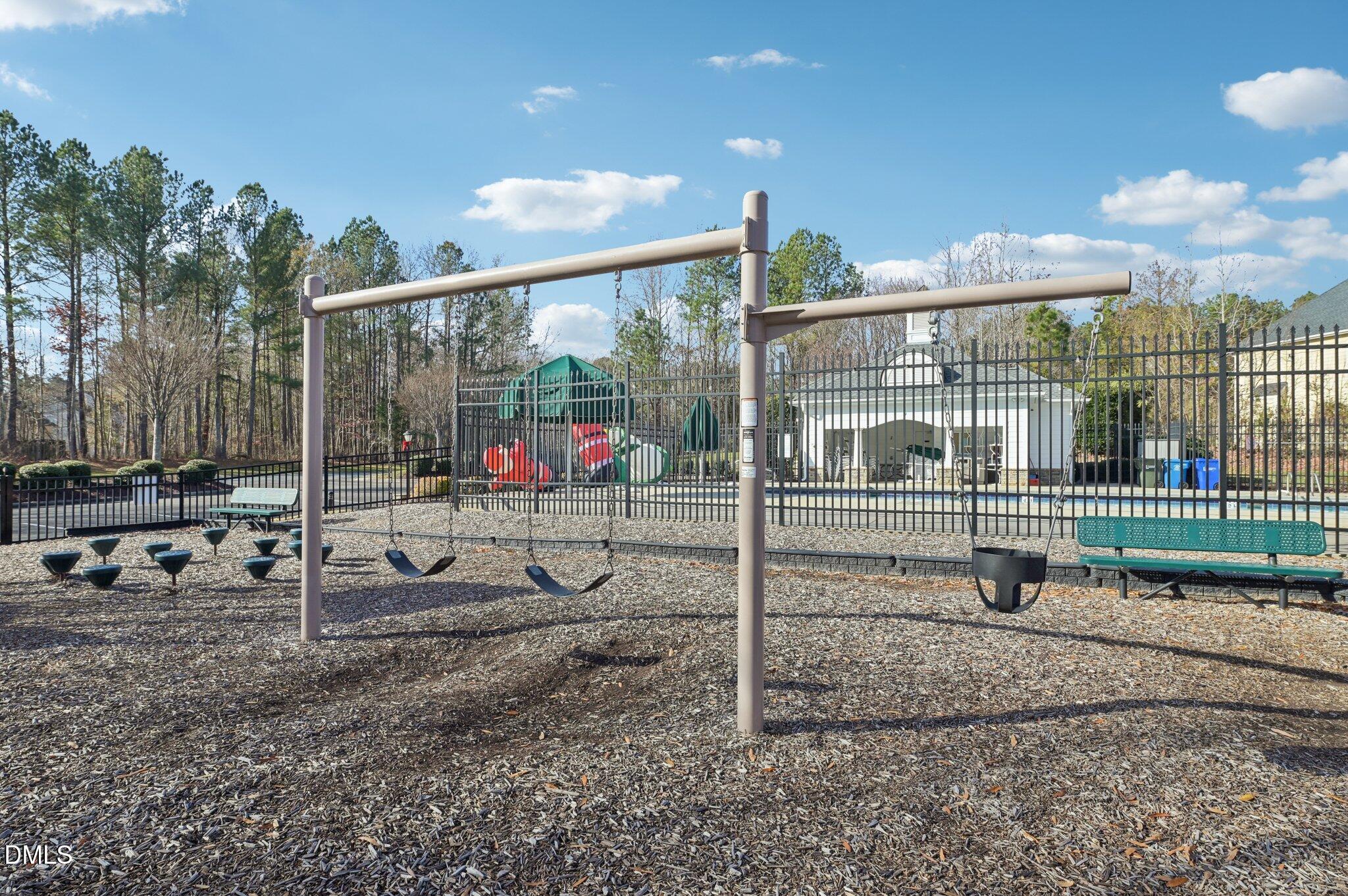 7 Brightfield Lane Durham, NC 27712 - Photo 40 of 41 a childrens park with lots of swings and slides