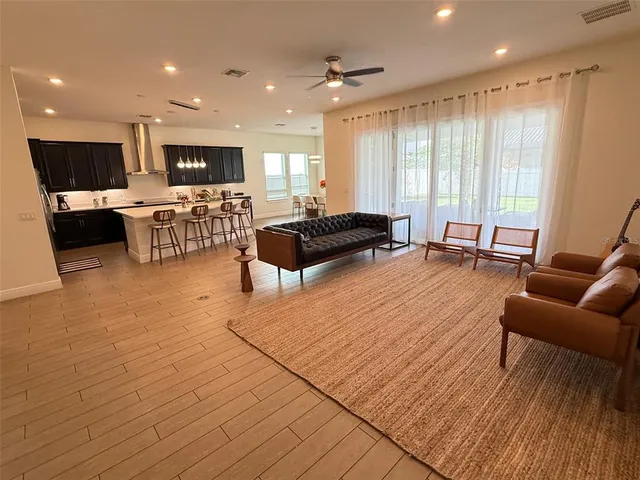 a utility room with sink dryer and washer