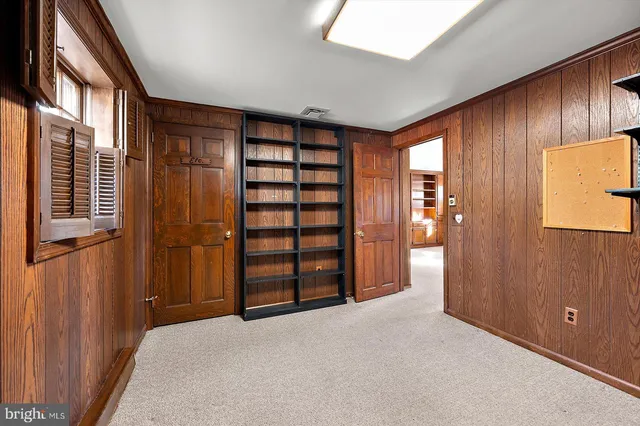 a view of a kitchen with a refrigerator and washer