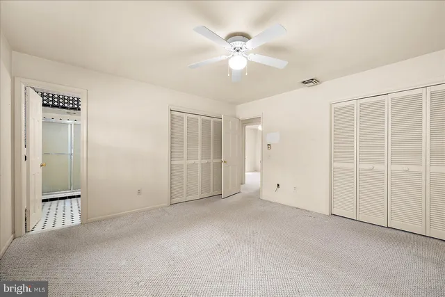 a bathroom with a sink a mirror and a shower