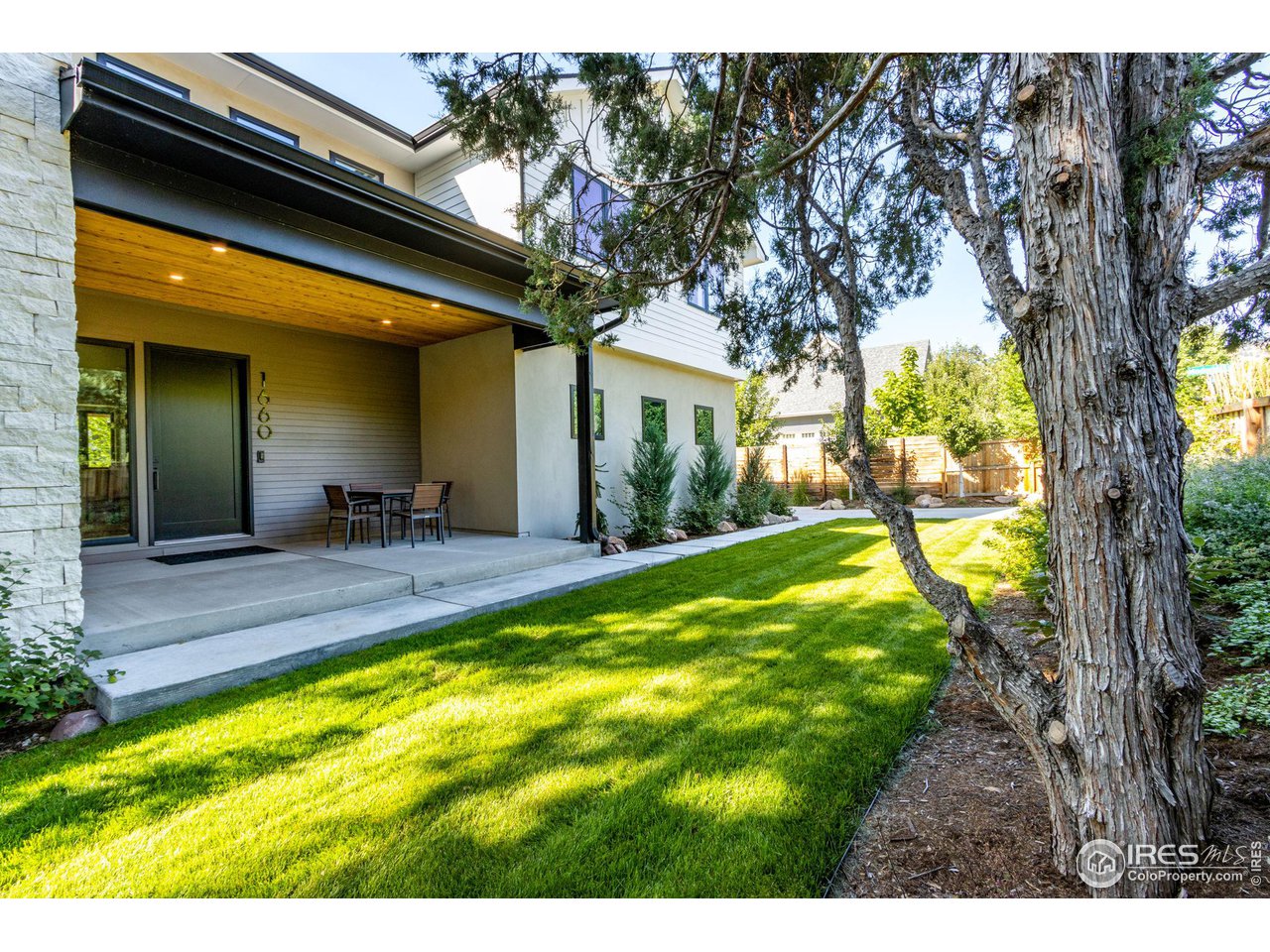1660 Violet Avenue Boulder, CO 80304 - Photo 35 of 40 a view of an house with swimming pool outdoor seating