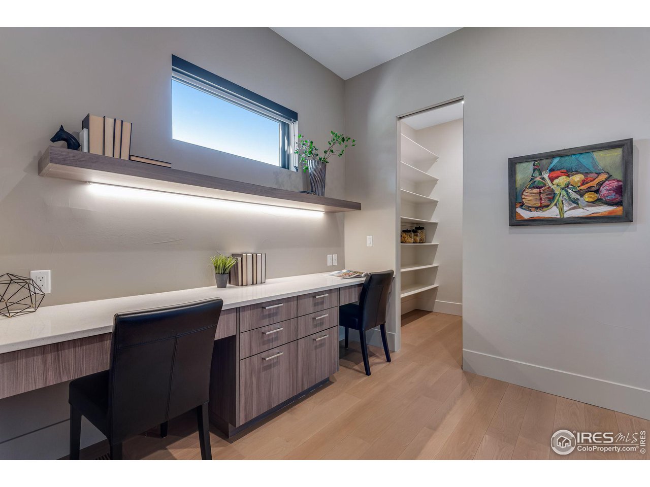 1660 Violet Avenue Boulder, CO 80304 - Photo 10 of 40 a view of cabinets with wooden floor and furniture