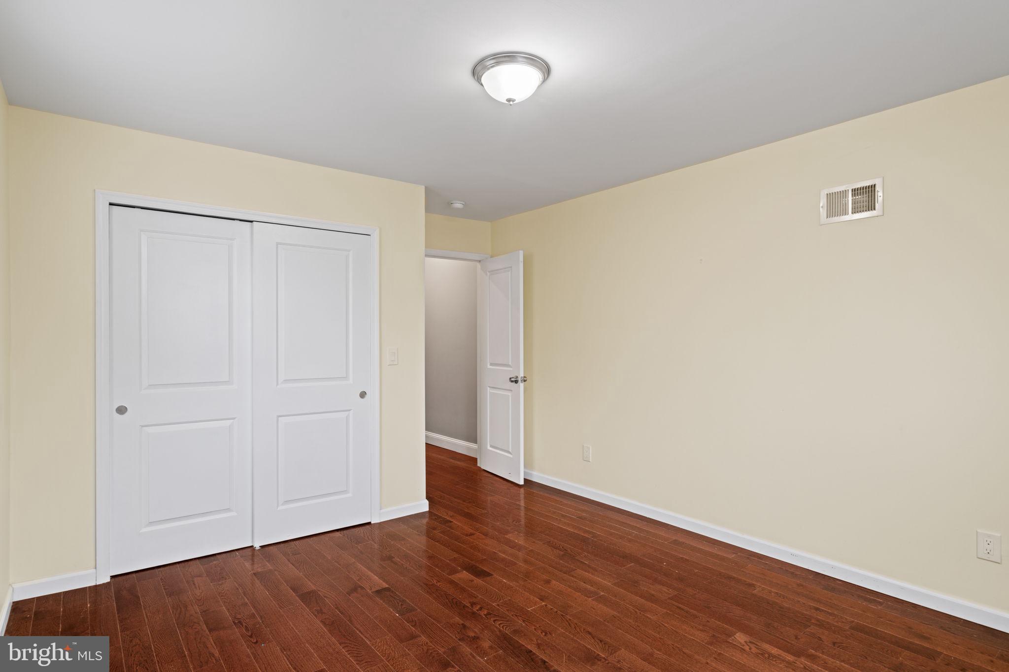 1926 Moore Street Philadelphia, PA 19145 - Photo 18 of 31 a view of an empty room with wooden floor