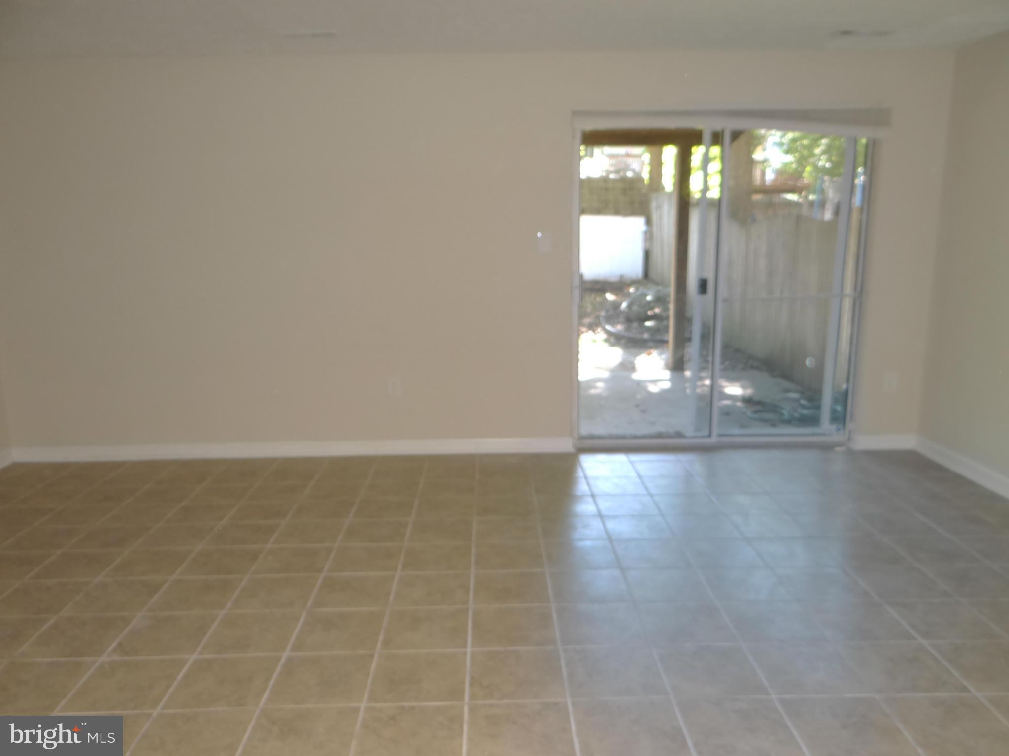 202 Windy Ridge Court Pasadena, MD 21122 - Photo 22 of 28 Ceramic Tile throughout Lower Level