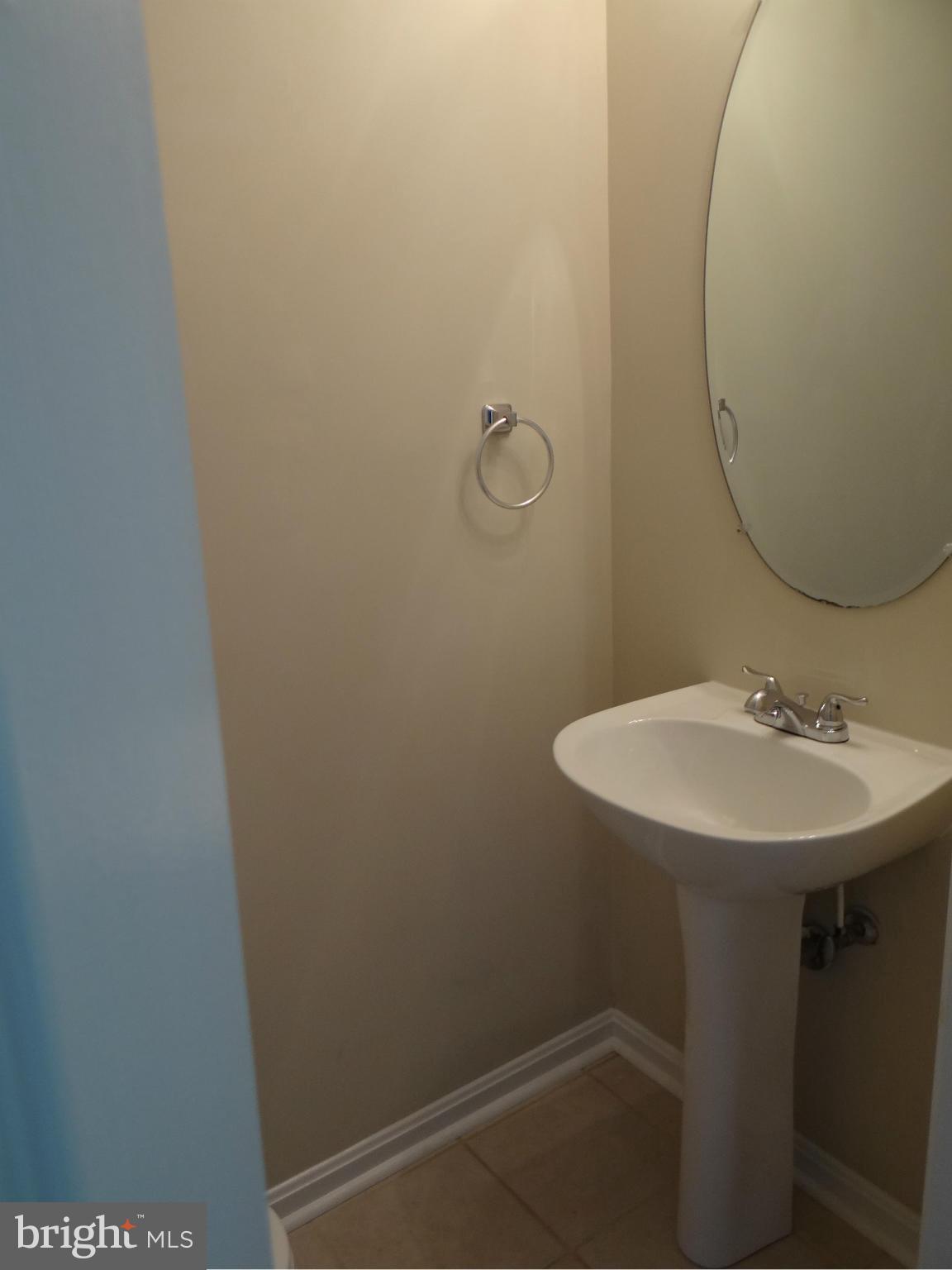 202 Windy Ridge Court Pasadena, MD 21122 - Photo 9 of 28 Half Bath on Main Level