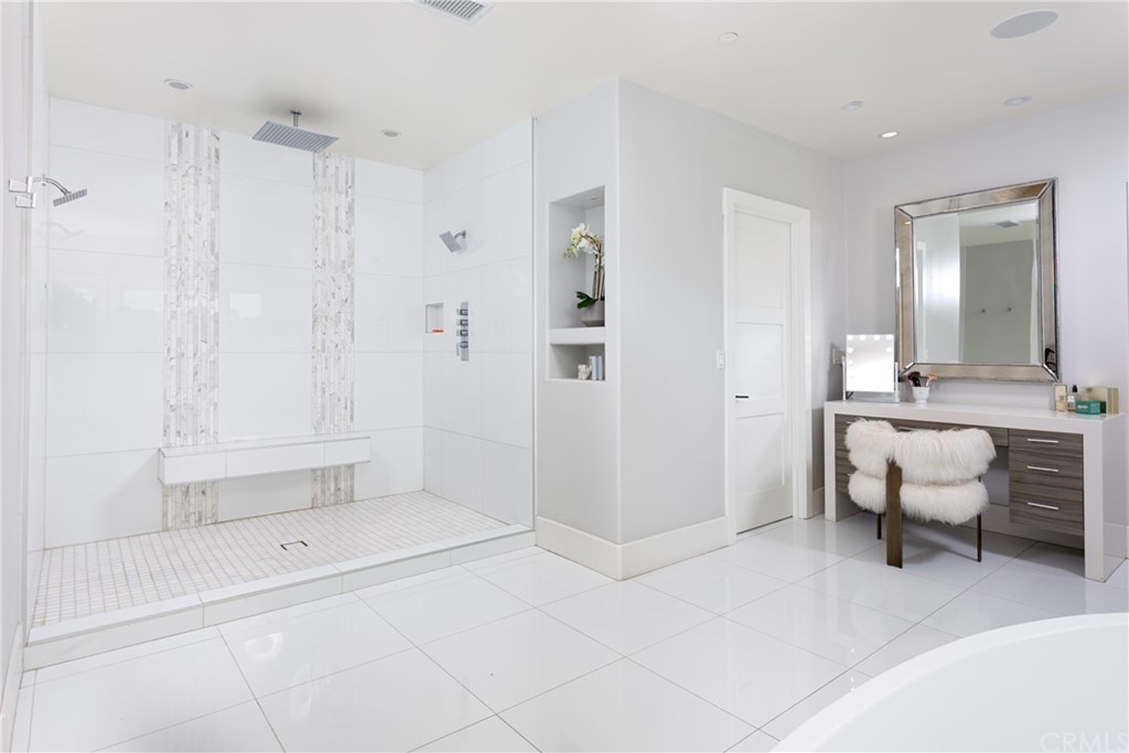 3 Vista Cielo Dana Point, CA 92629 - Photo 14 of 34 a bathroom with a bathtub and a shower