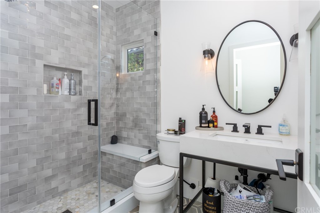3 Vista Cielo Dana Point, CA 92629 - Photo 19 of 34 a bathroom with a sink a toilet and a mirror