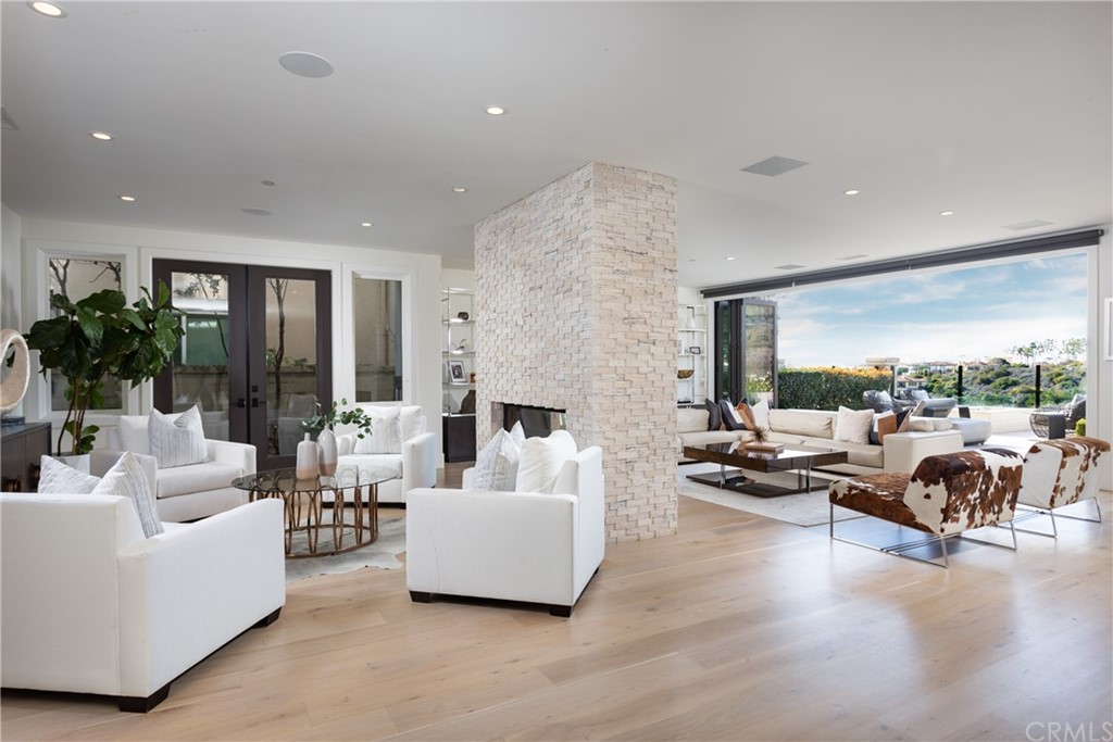 3 Vista Cielo Dana Point, CA 92629 - Photo 2 of 34 a living room with furniture and a large window
