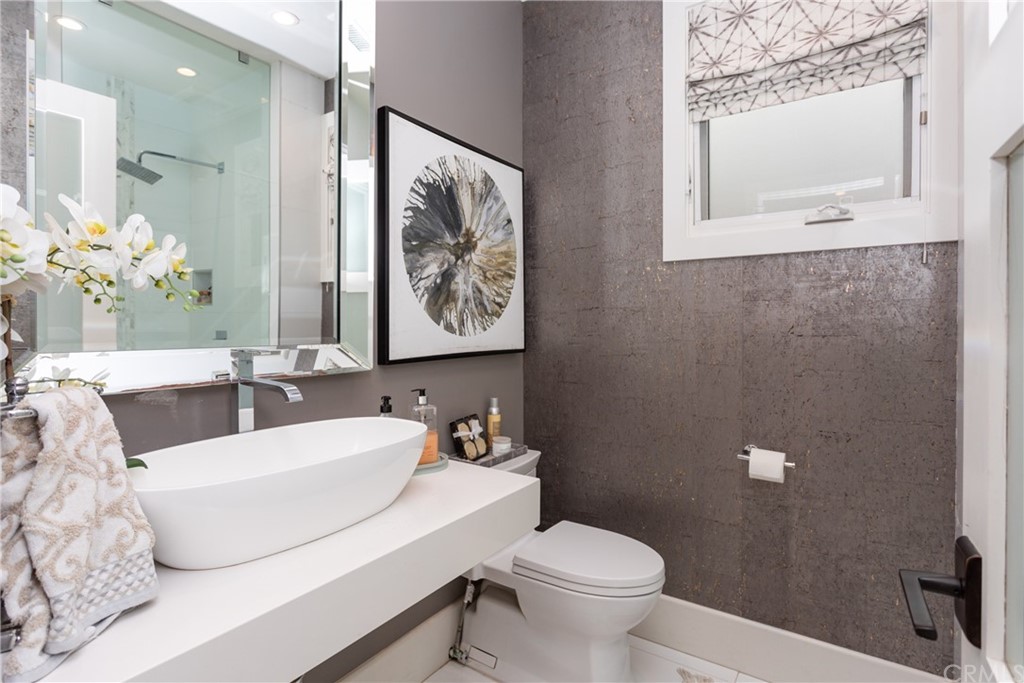 3 Vista Cielo Dana Point, CA 92629 - Photo 22 of 34 a bathroom with a sink and a mirror