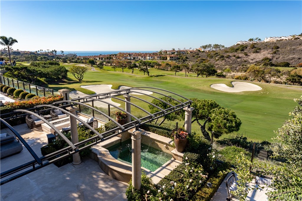 3 Vista Cielo Dana Point, CA 92629 - Photo 26 of 34 a view of a swimming pool with a table and chairs