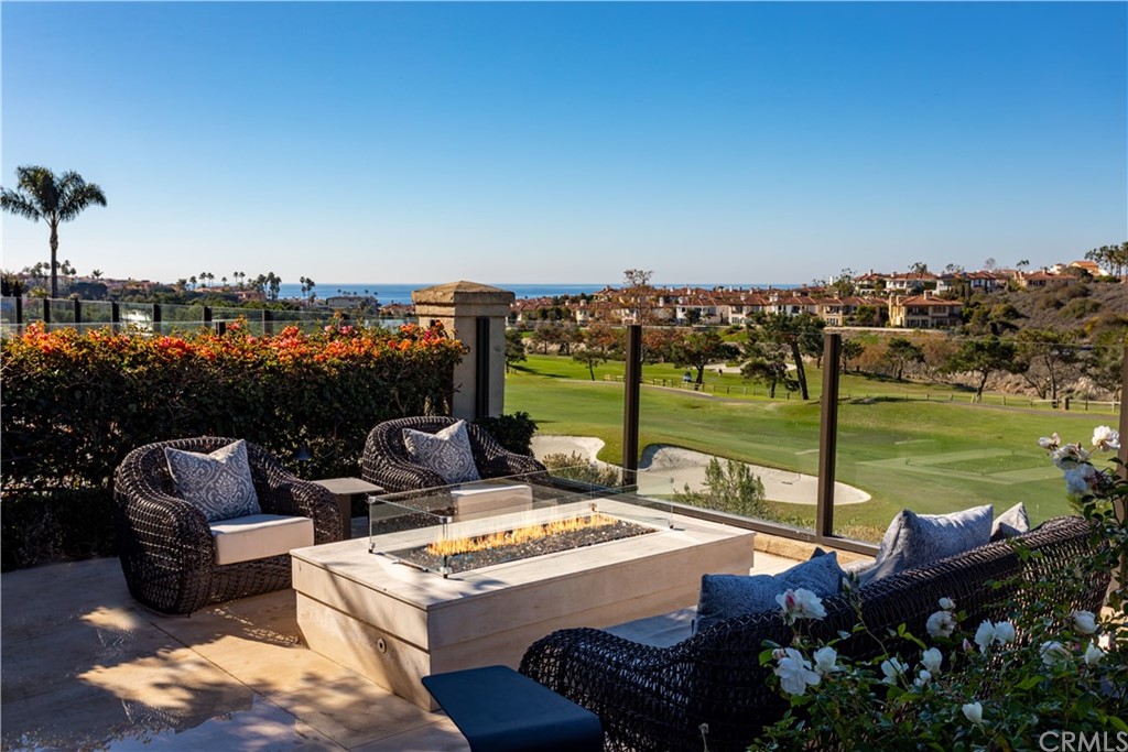 3 Vista Cielo Dana Point, CA 92629 - Photo 27 of 34 a view of a patio with couches table and chairs and potted plants