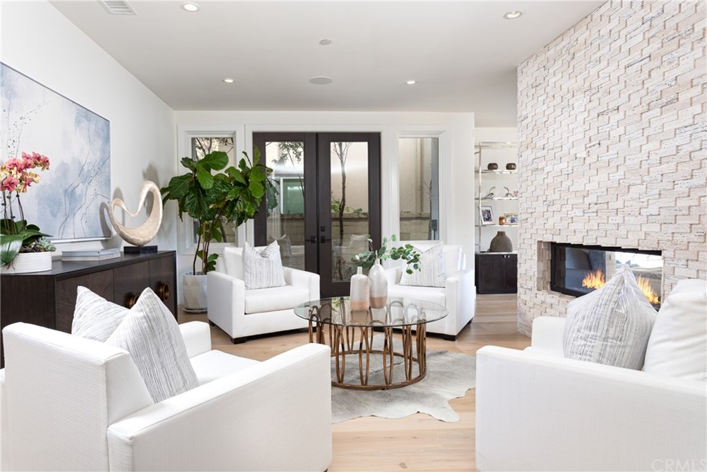 3 Vista Cielo Dana Point, CA 92629 - Photo 7 of 34 a living room with furniture and a fireplace
