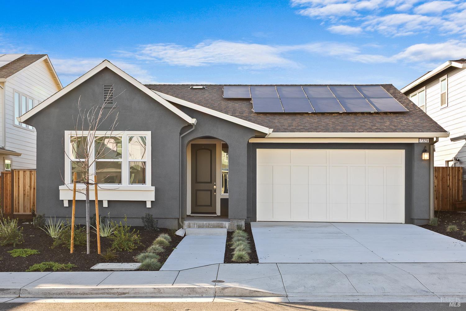 7325 Willowglen Drive Rohnert Park, CA 94928 - Photo 1 of 20 a front view of a house with garden