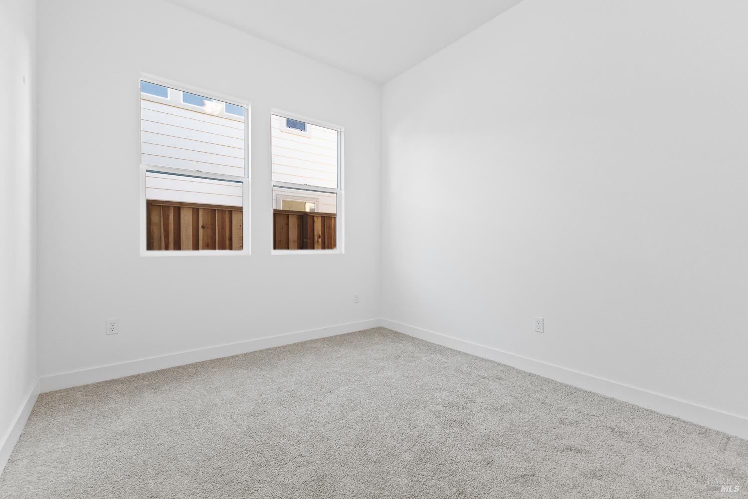 7325 Willowglen Drive Rohnert Park, CA 94928 - Photo 14 of 20 an empty room with windows