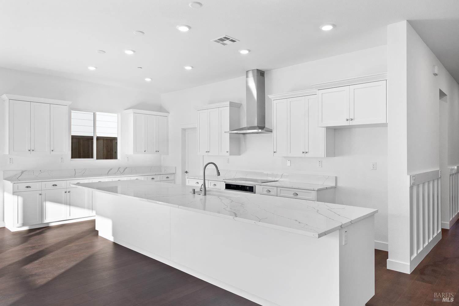 7325 Willowglen Drive Rohnert Park, CA 94928 - Photo 5 of 20 a kitchen with kitchen island a sink stainless steel appliances and cabinets