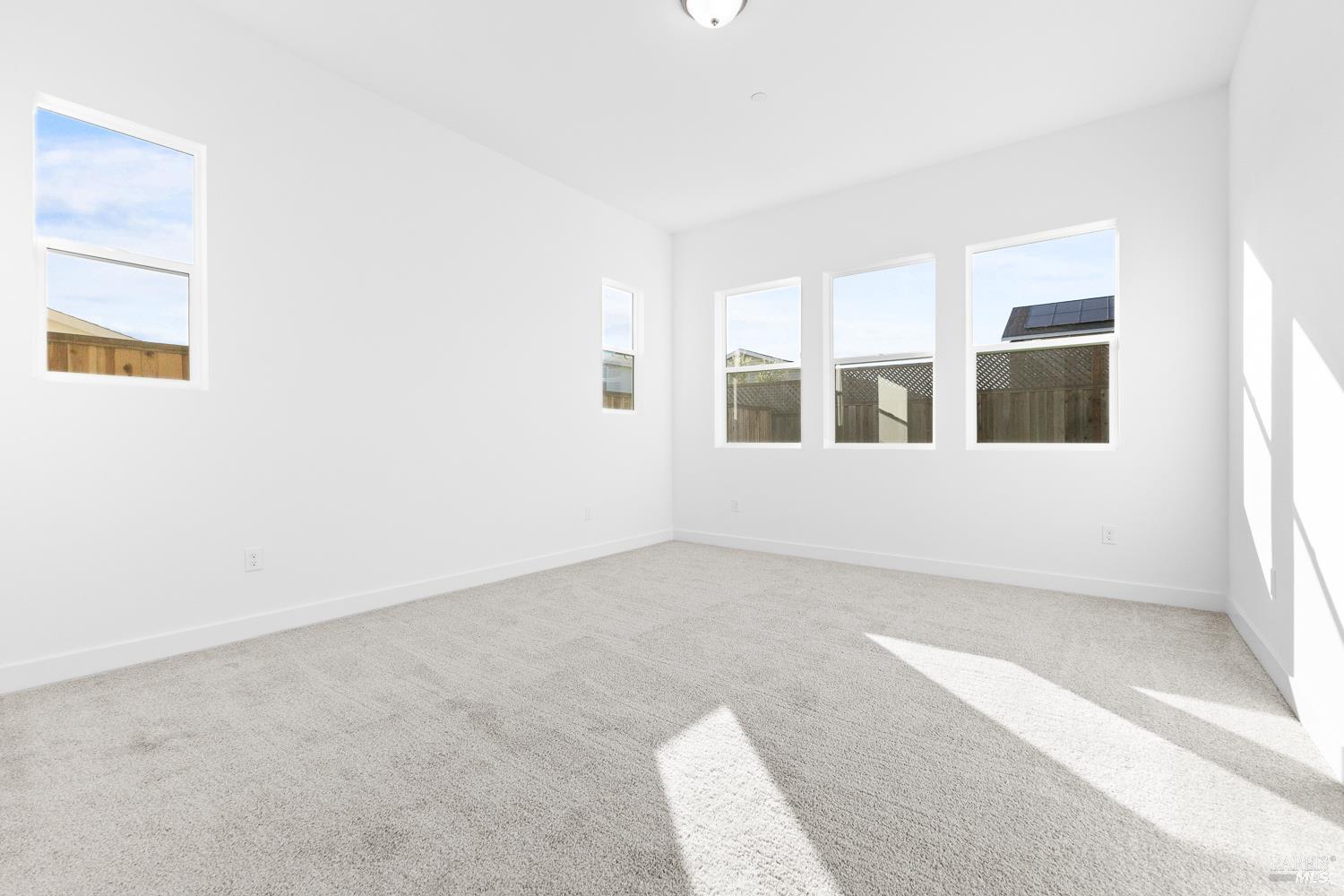 7325 Willowglen Drive Rohnert Park, CA 94928 - Photo 6 of 20 an empty room with windows