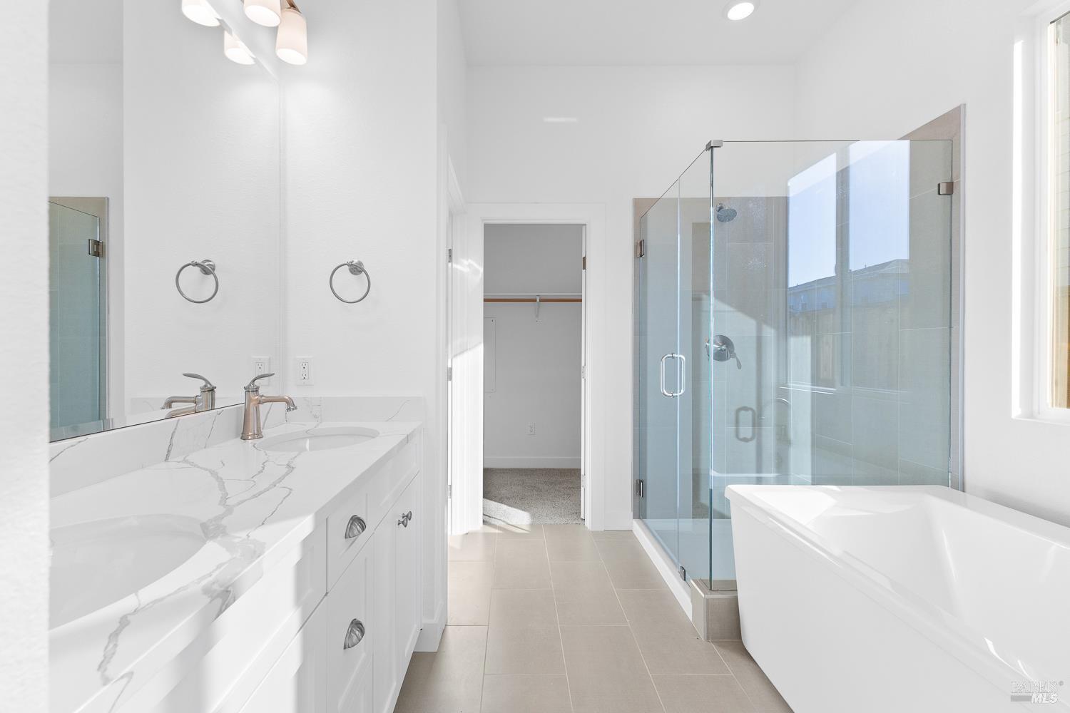 7325 Willowglen Drive Rohnert Park, CA 94928 - Photo 8 of 20 a bathroom with a tub sink and mirror