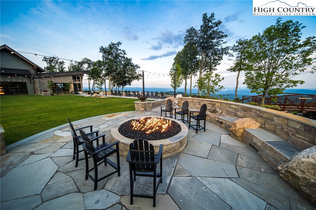 471 Red Cedar Road Boone, NC 28607 - Photo 23 of 31 a view of a table and chairs in patio