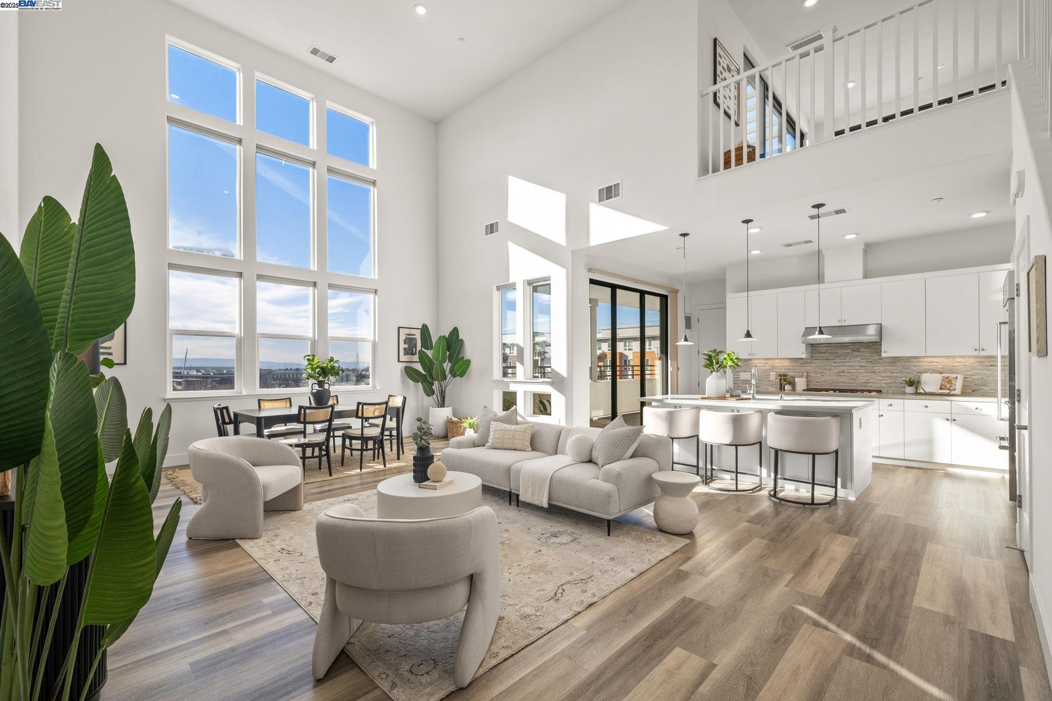45268 Navigation Street, Unit 401 Fremont, CA 94539 - Photo 1 of 1 a living room with fireplace furniture and a large window