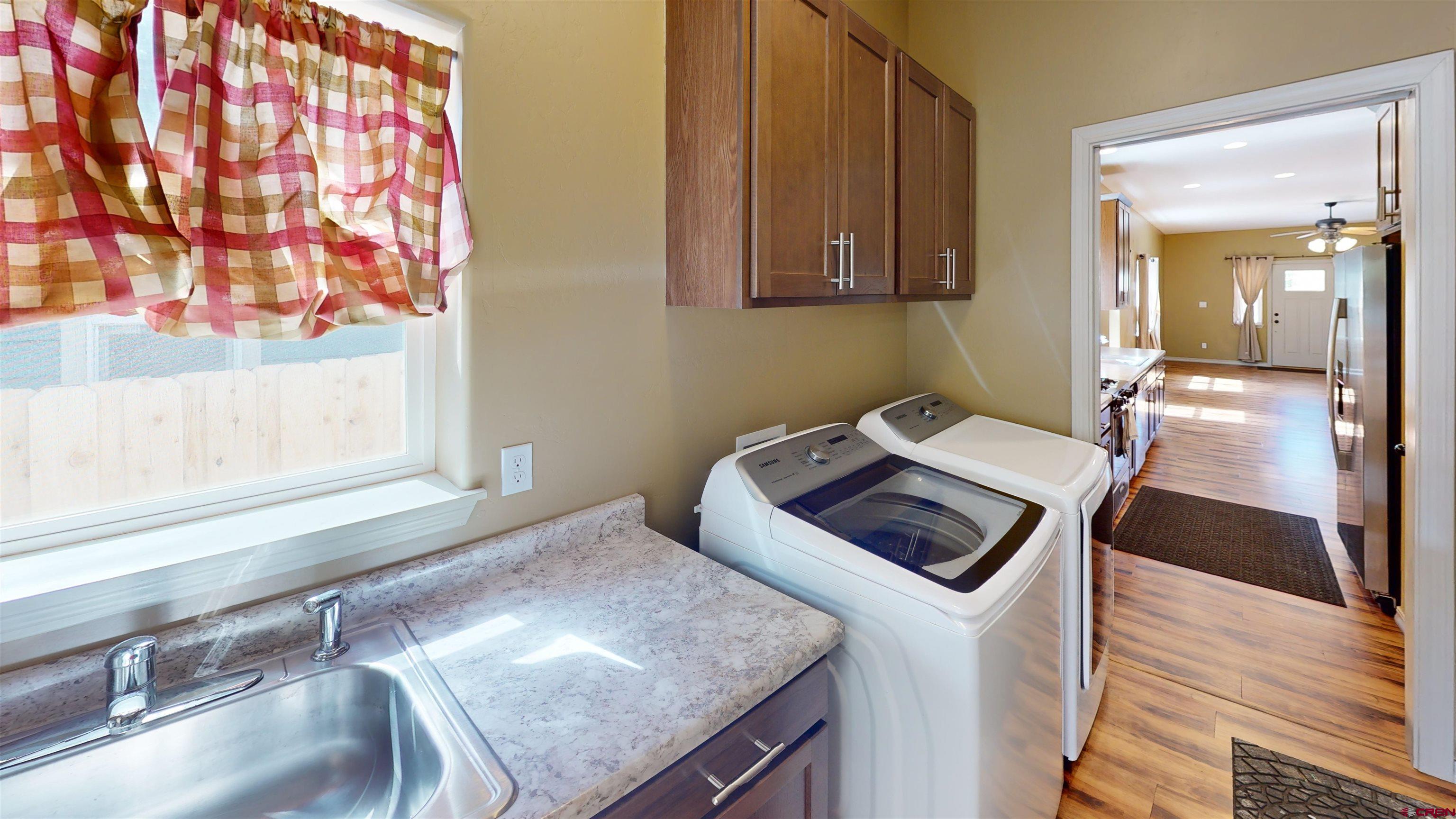 555 Confluence Avenue Durango, CO 81301 - Photo 25 of 27 a living room with a couch and a window