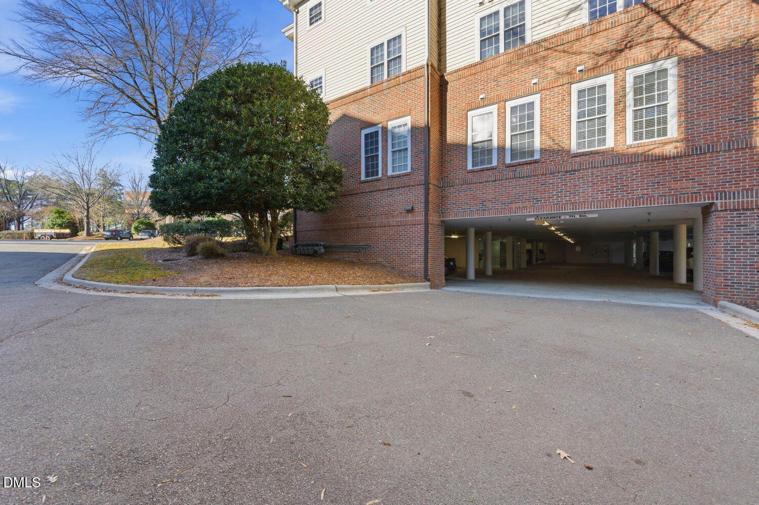 116 Northbrook Drive, Unit 204 Raleigh, NC 27609 - Photo 60 of 94 a view of a house with backyard and a tree