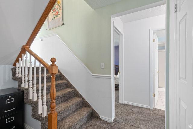 553 North 200 West Bountiful, UT 84010 - Photo 17 of 26 Stairs featuring carpet floors and a textured ceiling