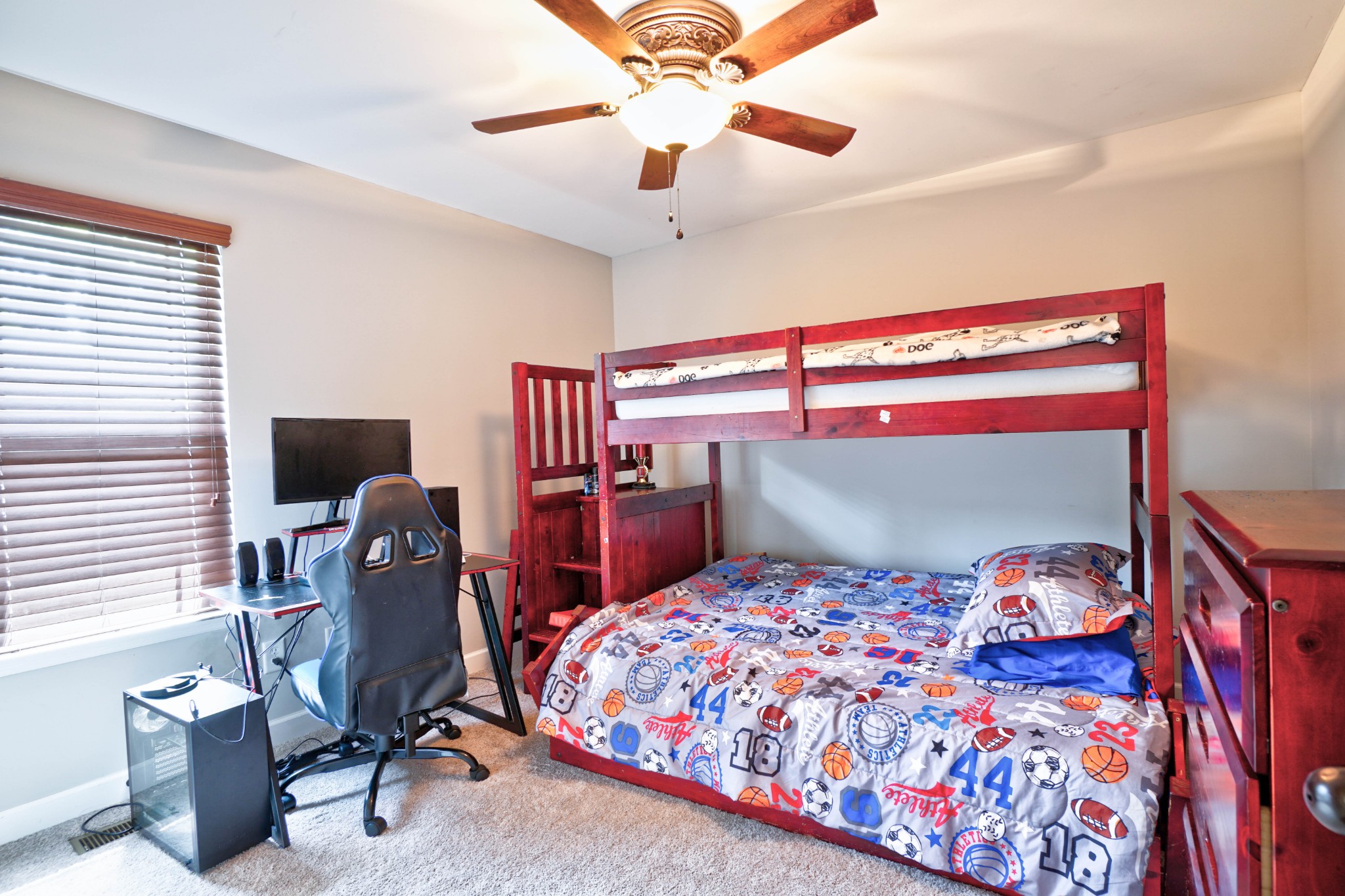 221 Abbey Road Lebanon, TN 37090 - Photo 23 of 36 a bedroom with a large bed and a chandelier
