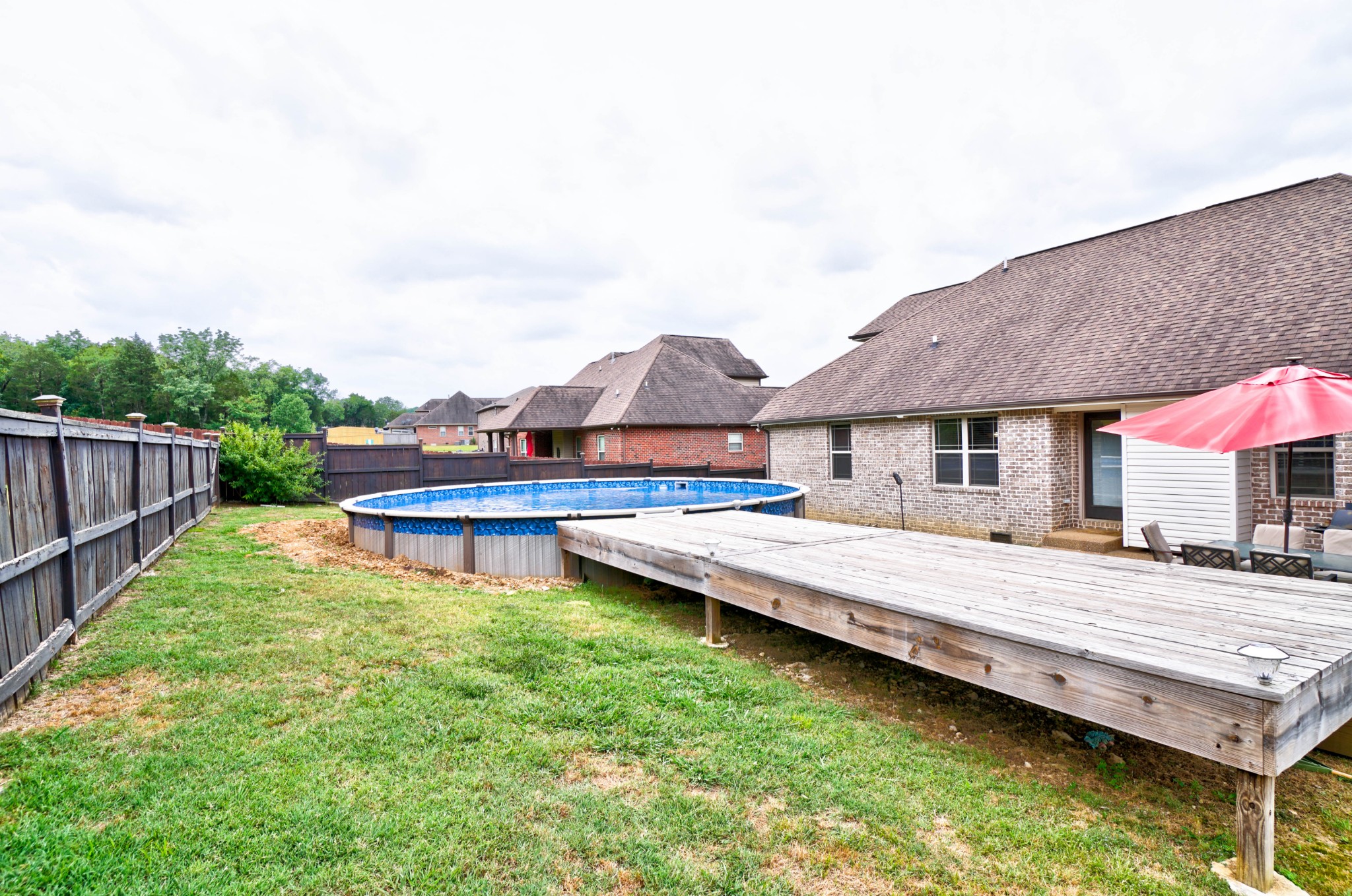 221 Abbey Road Lebanon, TN 37090 - Photo 32 of 36 a view of a house with pool and sitting area