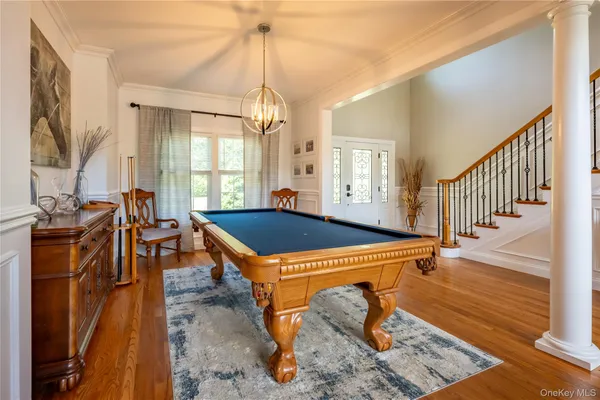 a view of a livingroom with furniture and a window