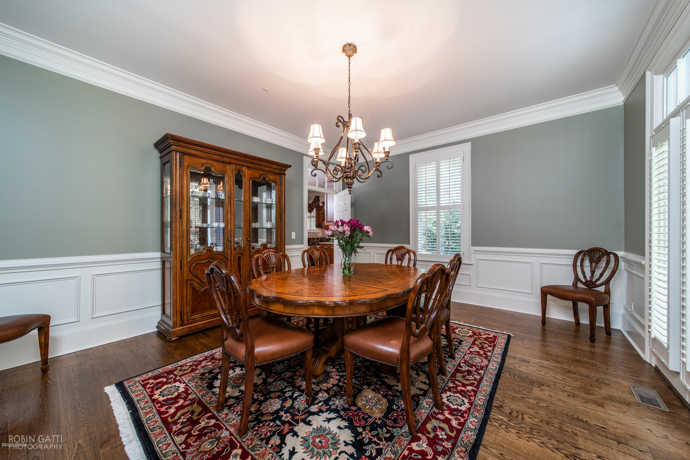 6356 New Forsyth Road Macon, GA 31210 - Photo 14 of 52 a dining room with furniture a rug and wooden floor
