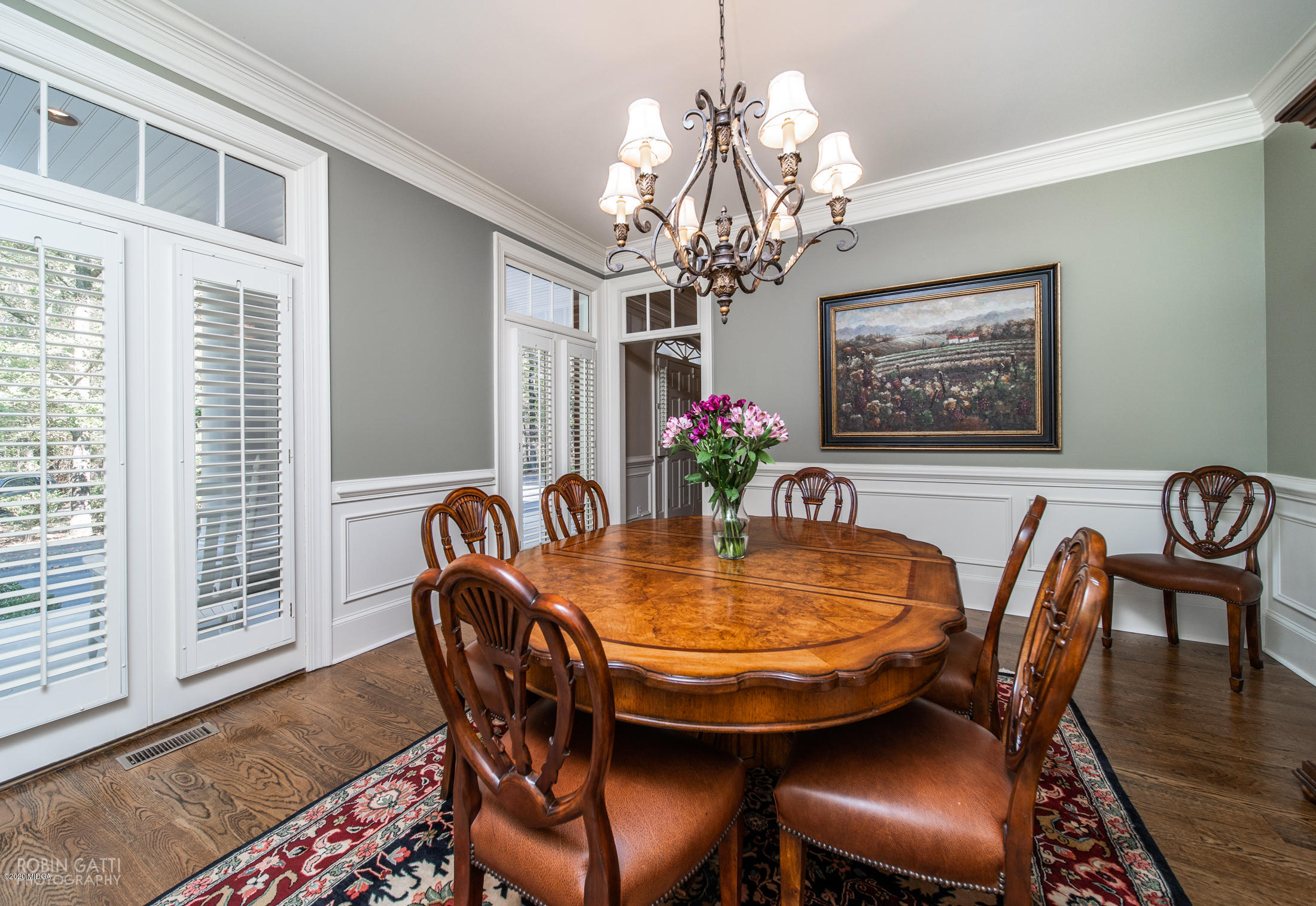 6356 New Forsyth Road Macon, GA 31210 - Photo 15 of 52 a view of a dining room with furniture wooden floor and chandelier