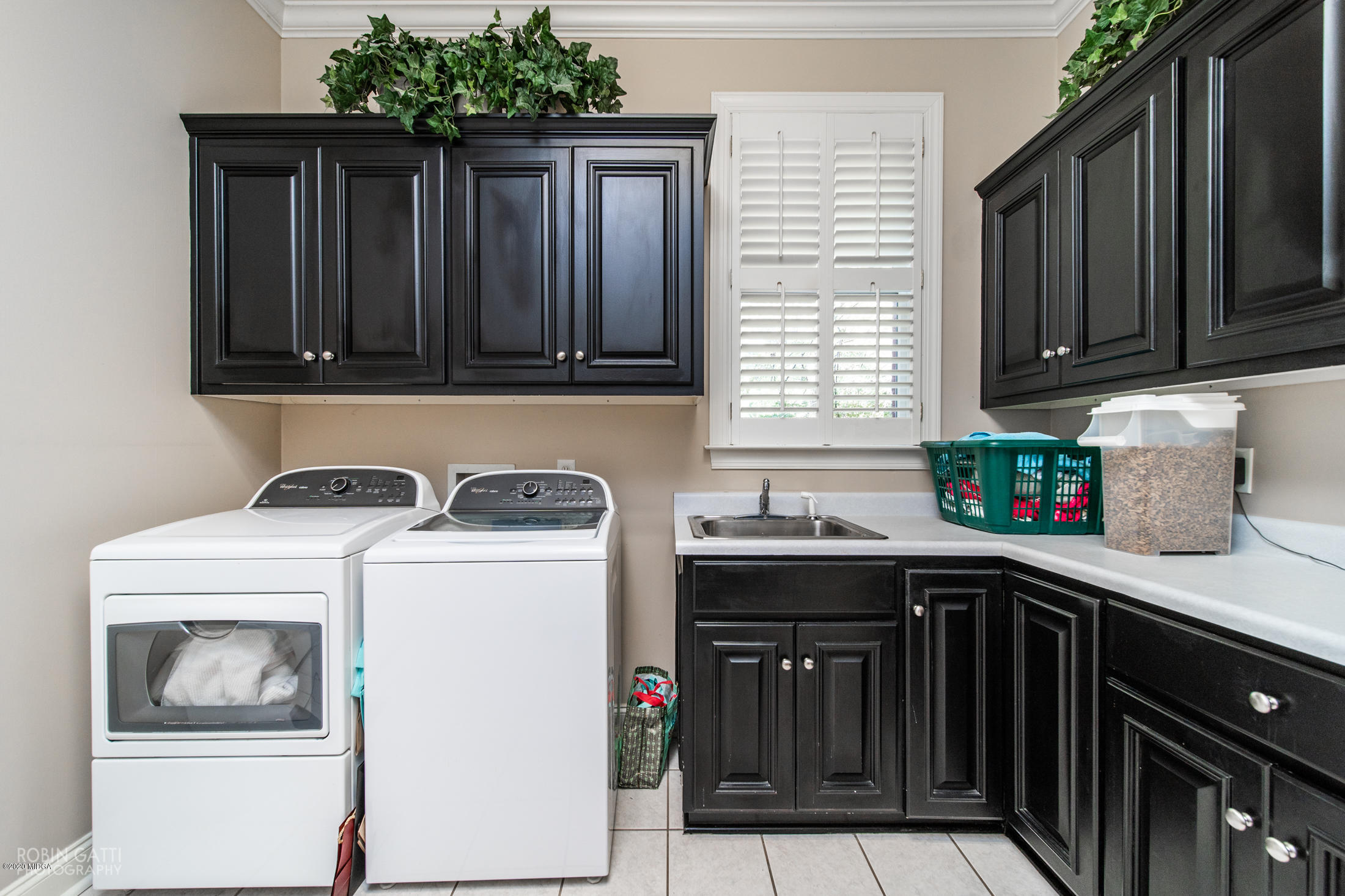6356 New Forsyth Road Macon, GA 31210 - Photo 25 of 52 a kitchen with a cabinets and a stove top oven