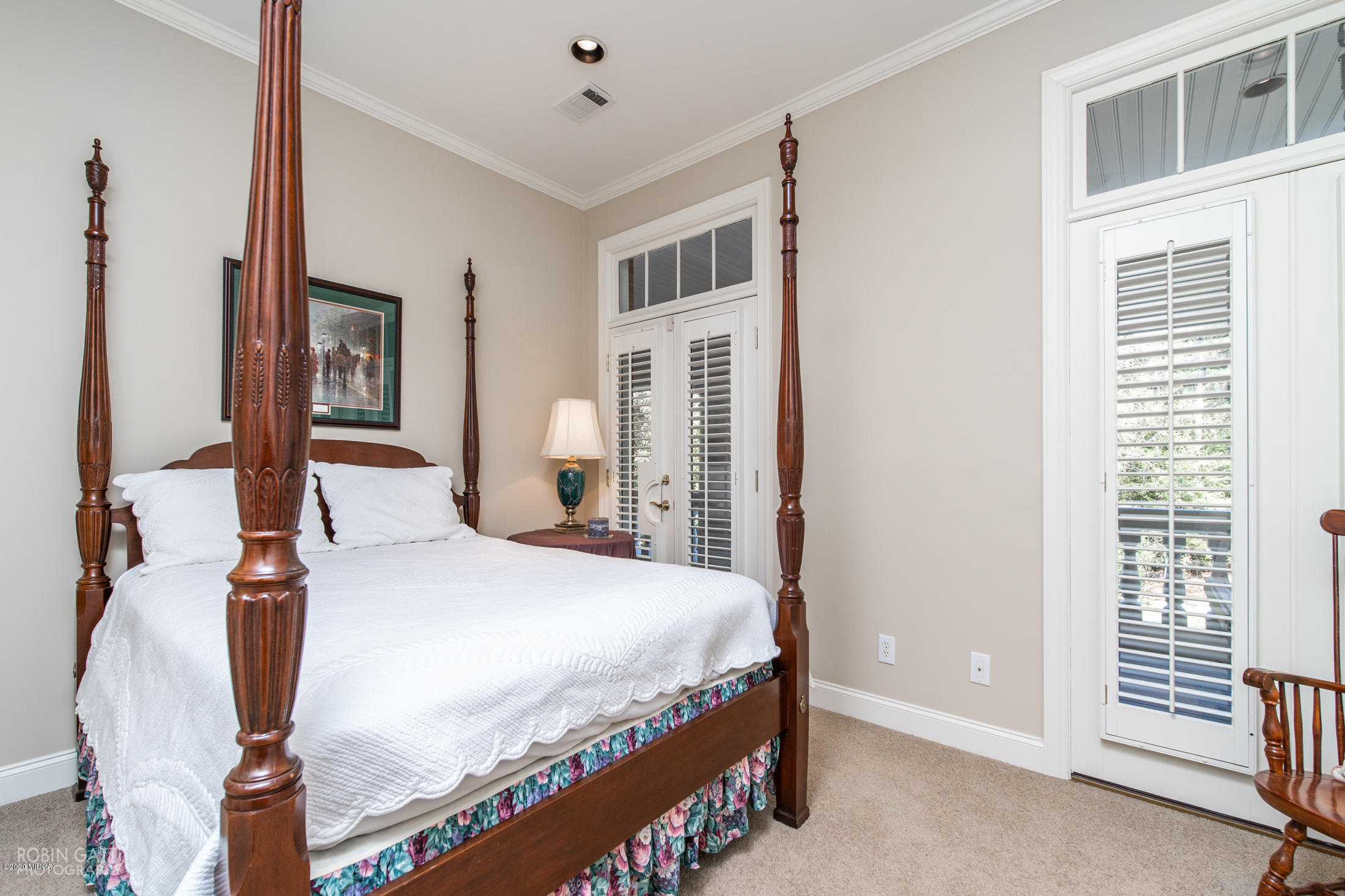 6356 New Forsyth Road Macon, GA 31210 - Photo 38 of 52 a bedroom with a large bed and a window