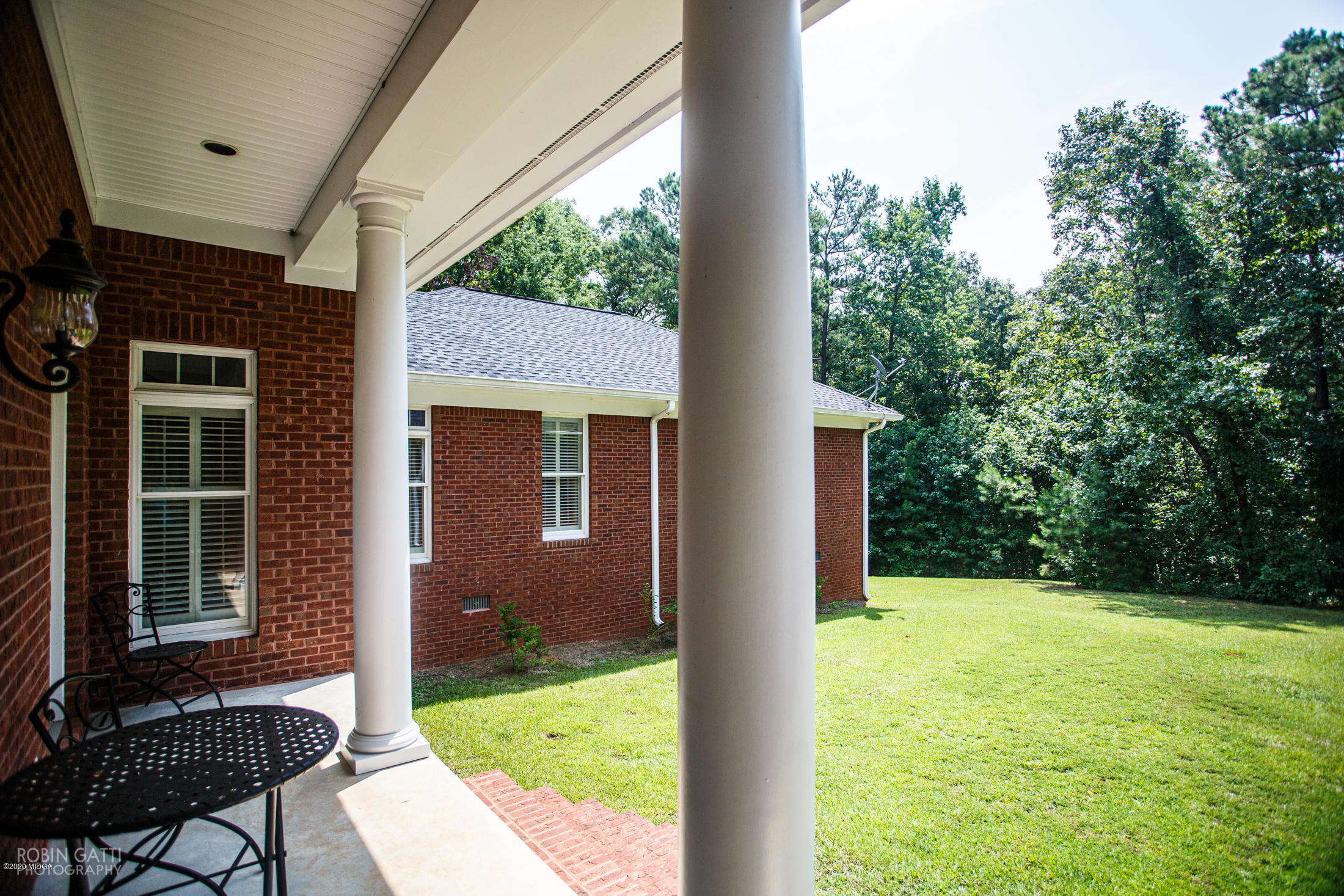 6356 New Forsyth Road Macon, GA 31210 - Photo 45 of 52 a view of house with backyard porch and furniture