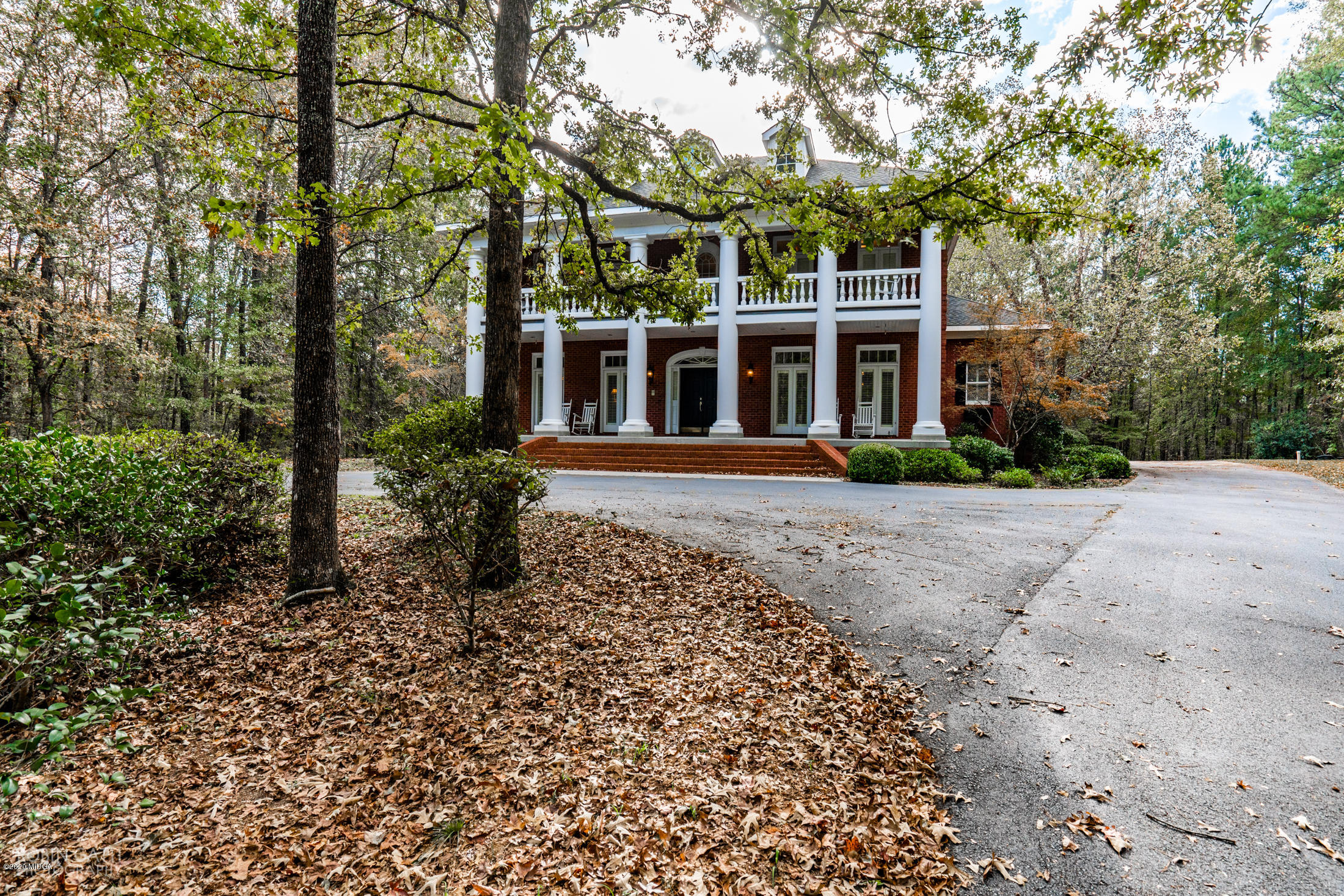 6356 New Forsyth Road Macon, GA 31210 - Photo 51 of 52 front view of a house with a garden