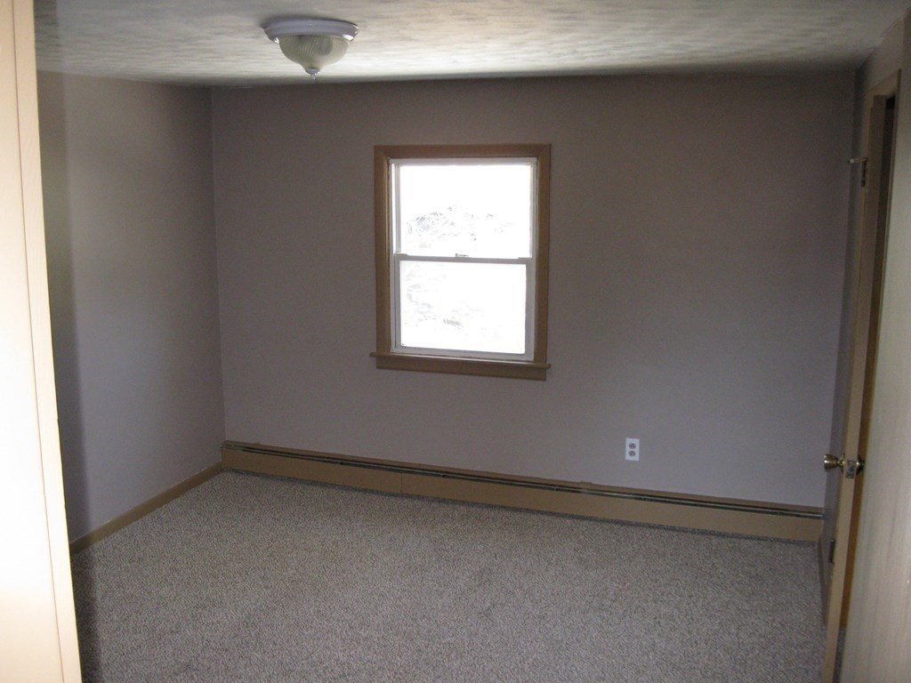 142 Killdeer Road Webster, MA 01570 - Photo 14 of 24 an empty room with a window