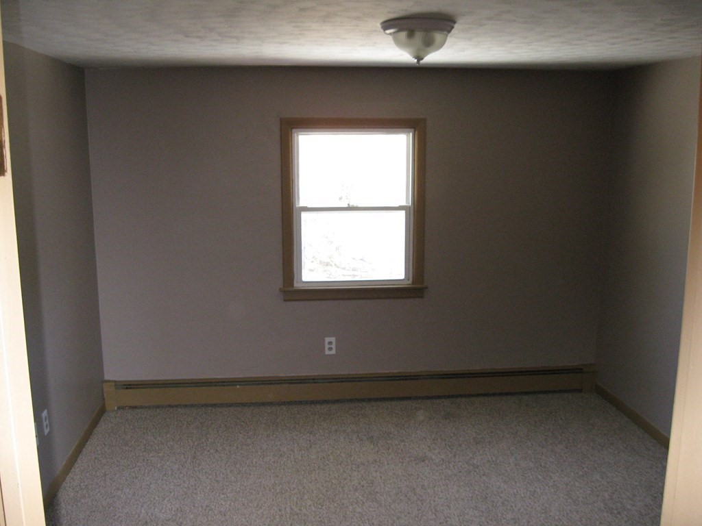 142 Killdeer Road Webster, MA 01570 - Photo 19 of 24 a view of a window in an empty room