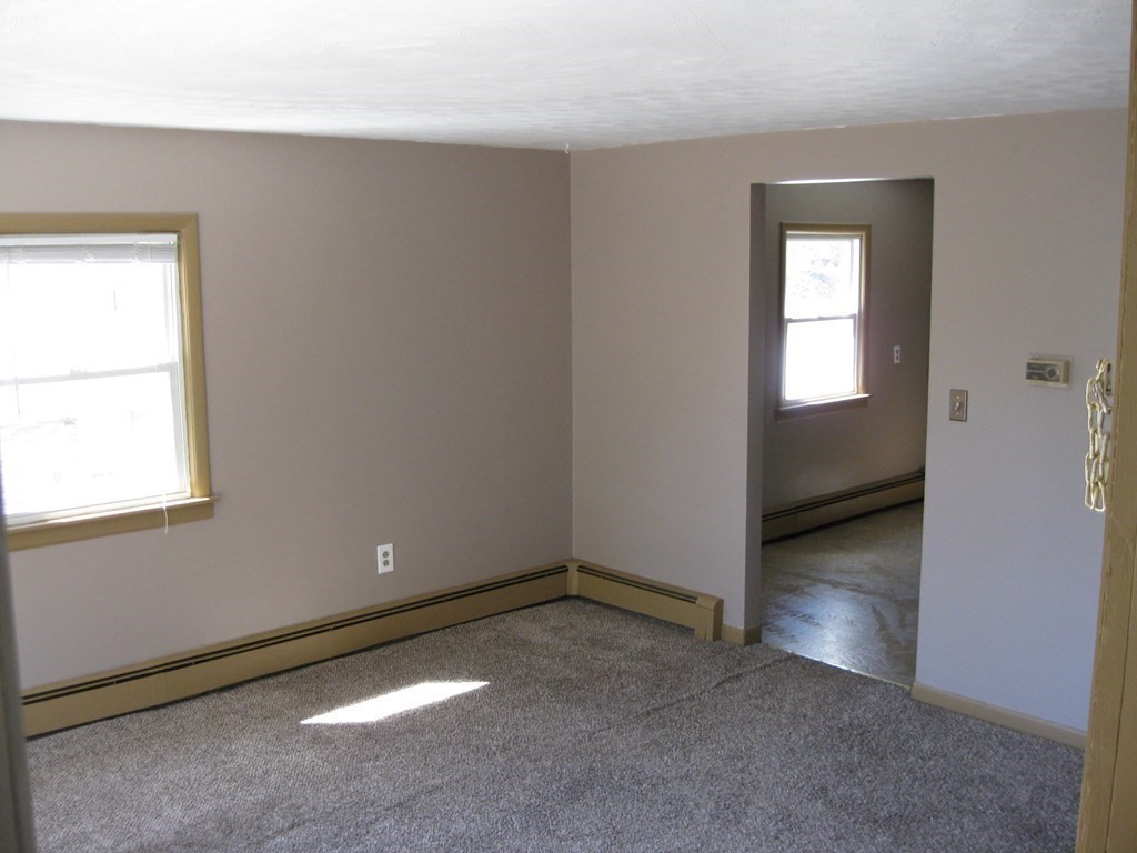 142 Killdeer Road Webster, MA 01570 - Photo 20 of 24 an empty room with a window