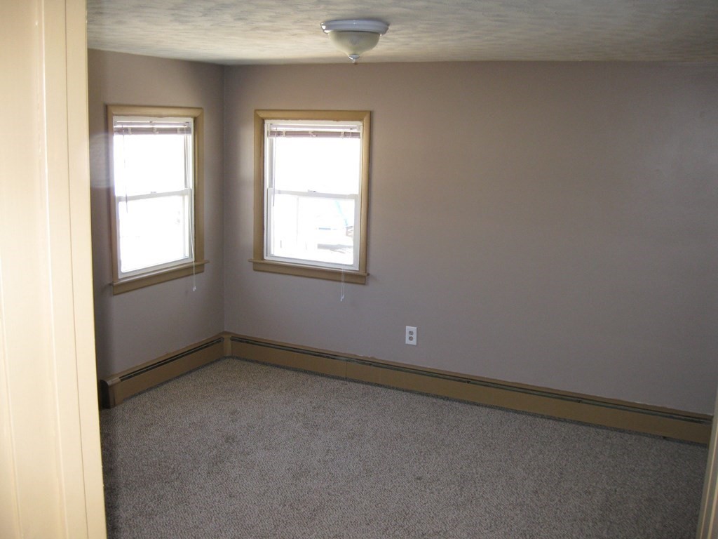 142 Killdeer Road Webster, MA 01570 - Photo 23 of 24 an empty room with windows