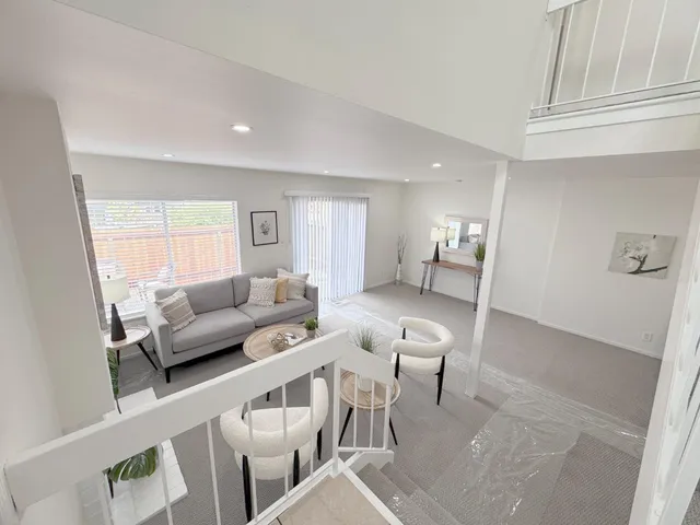 a living room with furniture and a couch