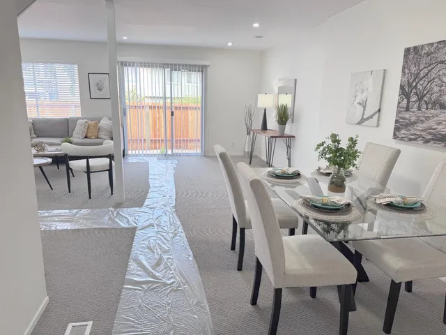 a view of a dining room with furniture
