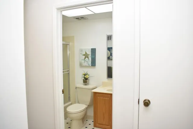 a bathroom with a toilet and a sink