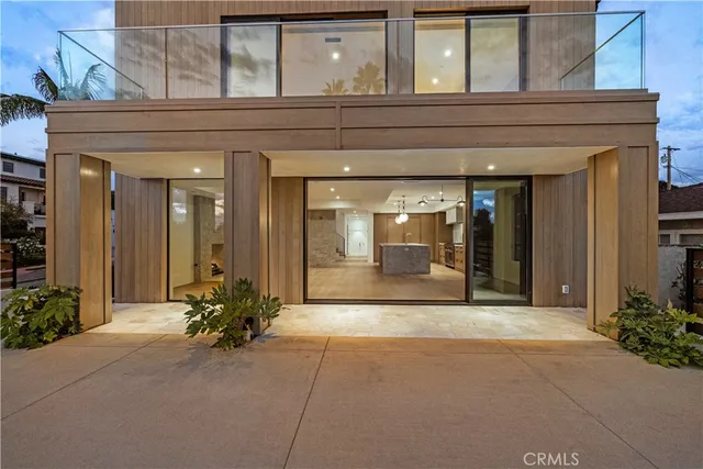 a view of a building with potted plants