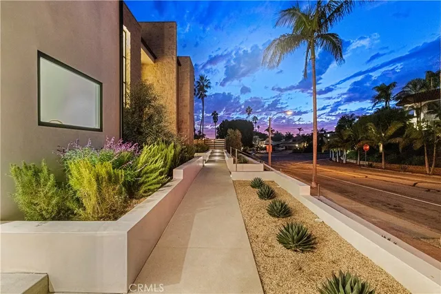 a view of a house with a swimming pool