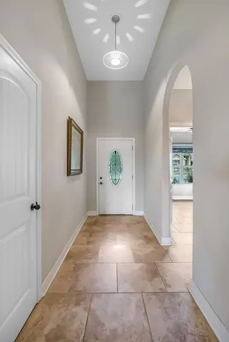 a view of an empty room and window