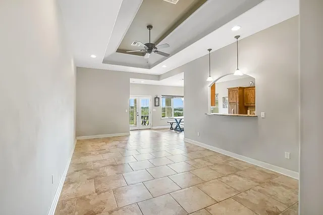 a view of an empty room and window
